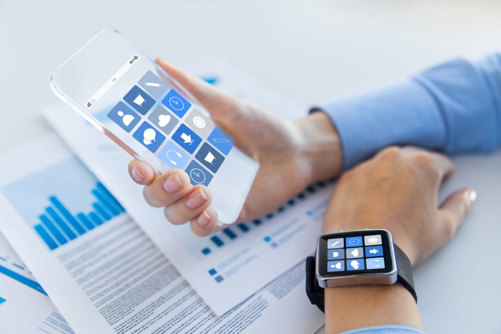 Software as a Medical Device displayed on a smartphone and connected smartwatch.